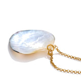 Pearl necklace with a gold chain on a white background
