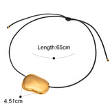 Gold necklace with measurements on a white background