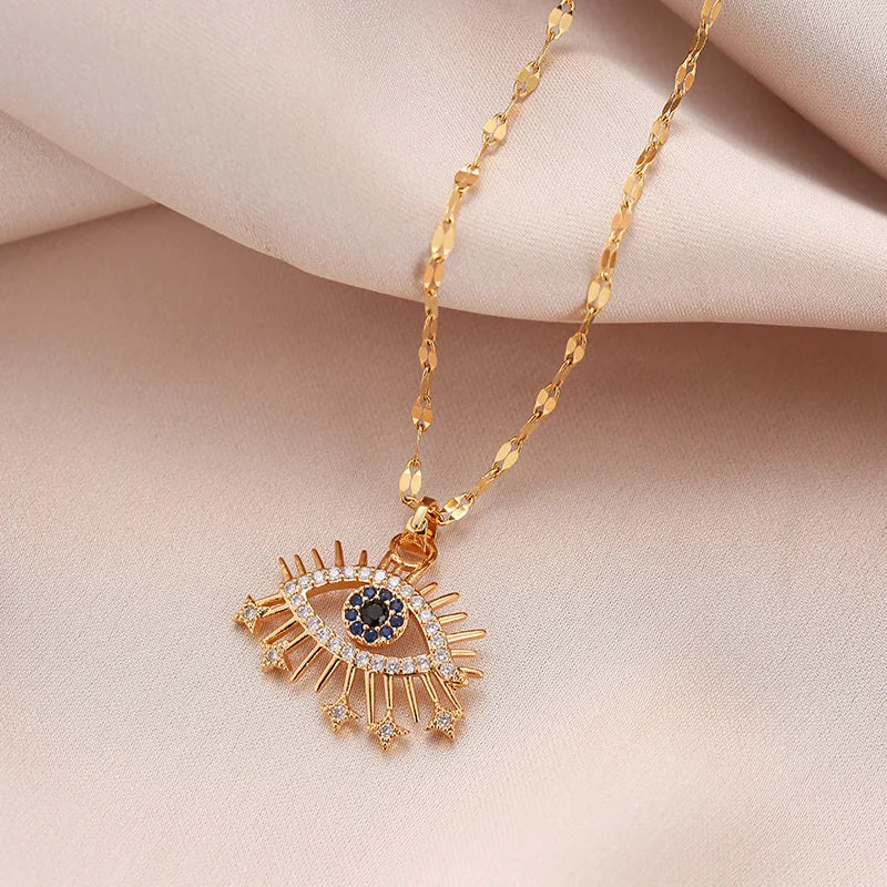 Gold Egyptian necklace featuring an evil eye pendant with cubic zirconia for protection and spiritual symbolism