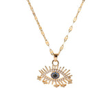 Gold Egyptian Eye Necklace with cubic zirconia evil eye charm on delicate chain, symbolizing protection and wisdom.