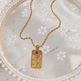 Elegant gold lovers tarot card pendant featuring rose and star design with cubic zirconia, perfect symbolic jewelry for daily wear.