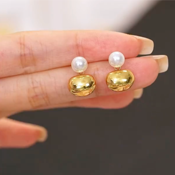 Lightweight gold bean drop earrings with soft pearl accents, designed for comfortable and stylish daily elegance