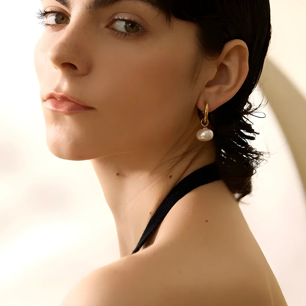 Korean-inspired simulated pearl dangle earrings in gold, crafted from stainless steel for elegant, everyday wear