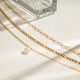 Elegant Layered Triple Chain Natural Pearl Necklace, 18K gold-plated with a pearl drop, perfect for adding a refined touch to any outfit.