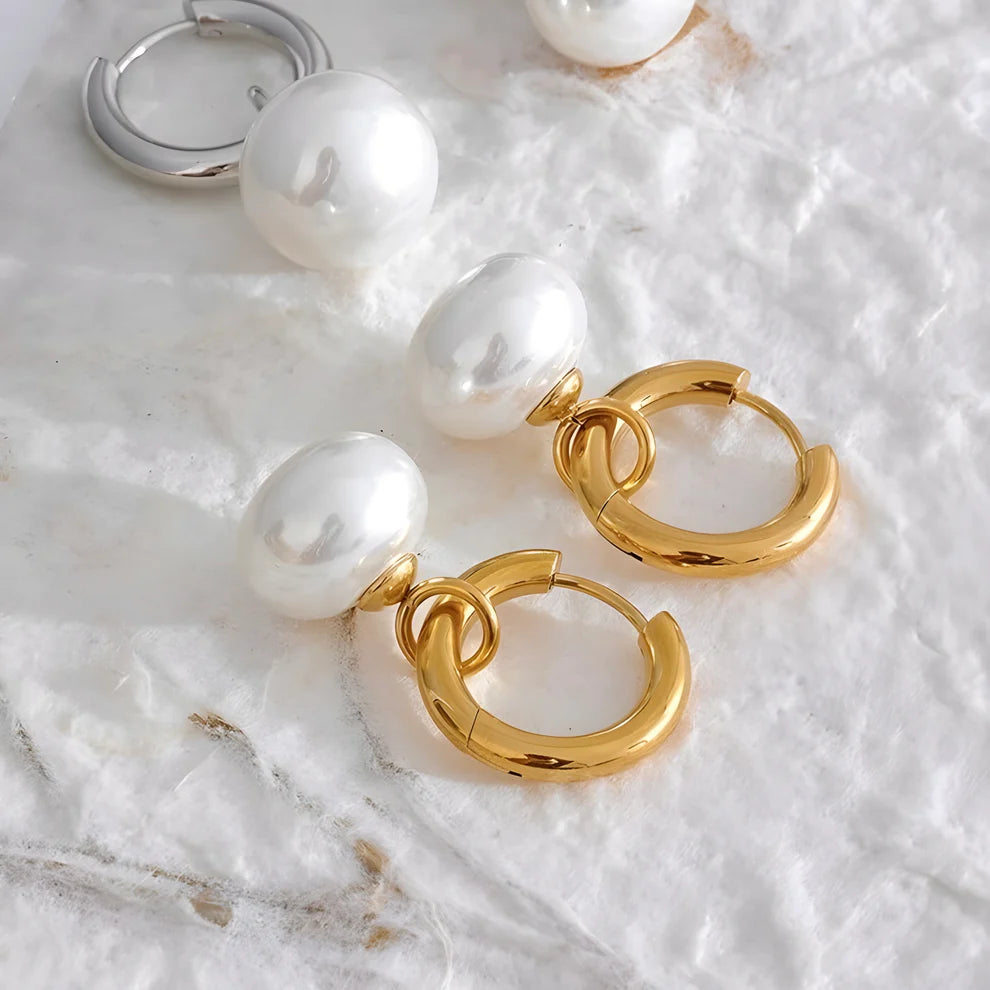 Lightweight simulated pearl earrings with gold finish, perfect for adding elegance to casual or formal looks