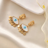 Gold-plated shell evil eye drop earrings with blue charm, lightweight and stylish for everyday wear and protection.