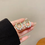 U-shaped pearl hoop earrings with 18k gold plated stainless steel, a stylish and refined accessory