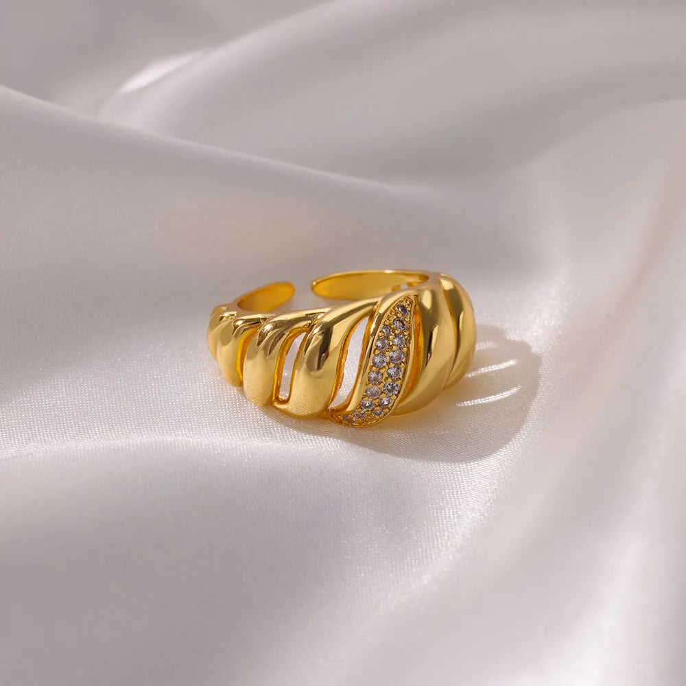 Beautiful 18K Gold-Plated Golden Wave Statement Ring with crystals, adjustable for a perfect fit and luxurious style.