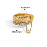 Gold and silver ring with measurements and product details on a white background