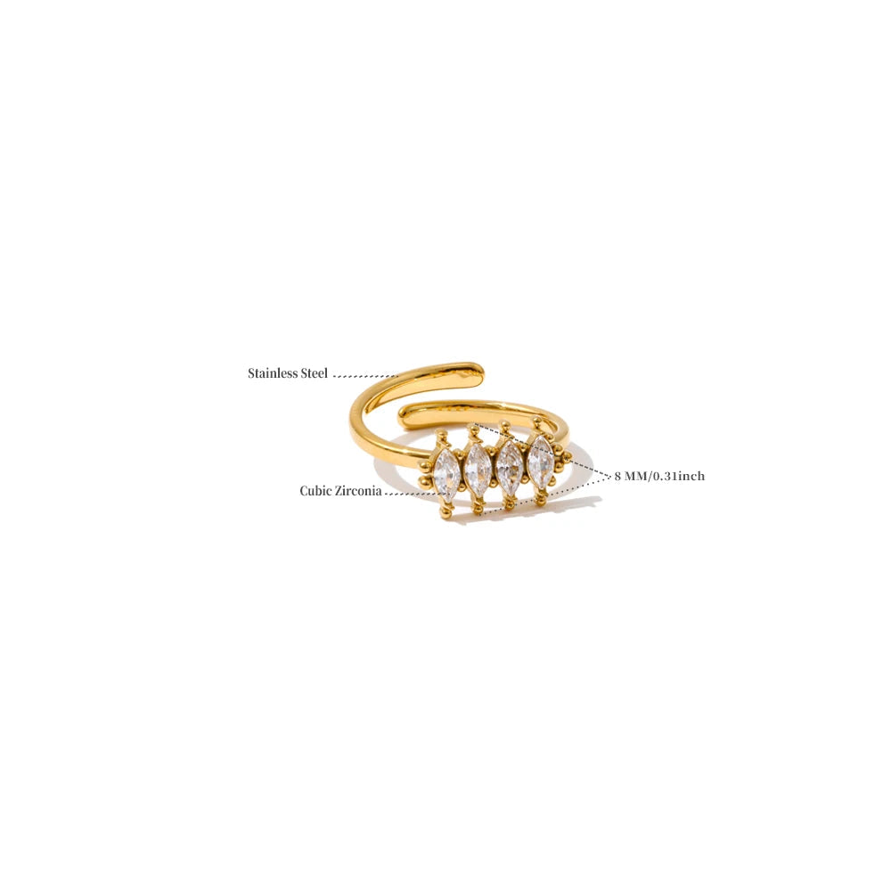 Gold ring with gemstones on a white background