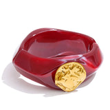 Resin wide bangle bracelet close-up texture — waterproof stainless steel core by Ezra Gems