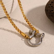 Gold-toned box chain lock pendant necklace with two-tone anchor clasp