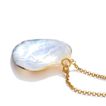 Pearl necklace with a gold chain on a white background 