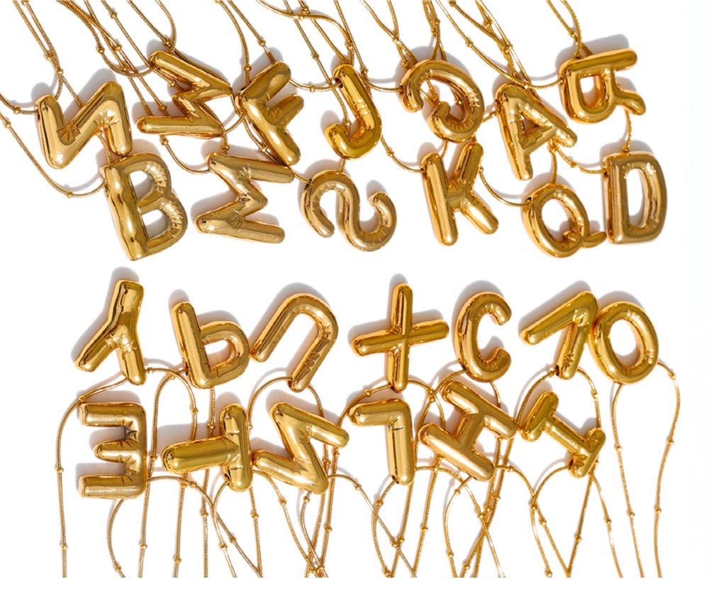 Gold letter-shaped balloons on a white background with 'Yarup' branding.