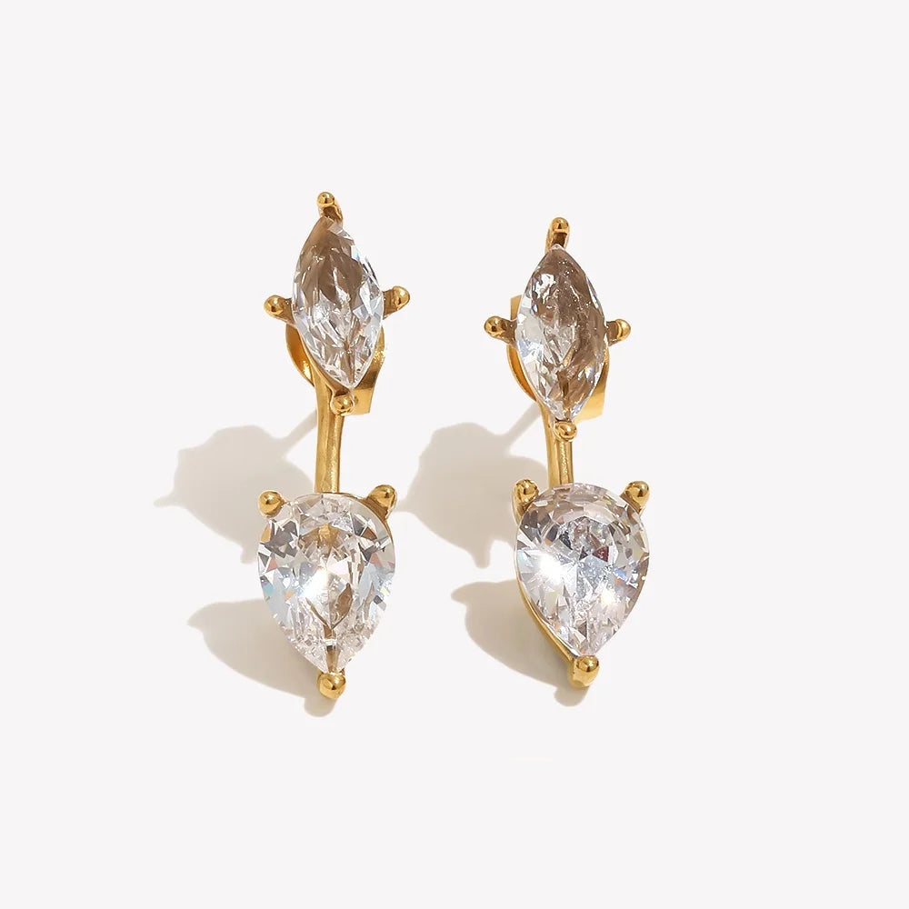 A pair of gold-tone drop earrings with marquise and pear-cut clear crystals, displayed on a clean white background.