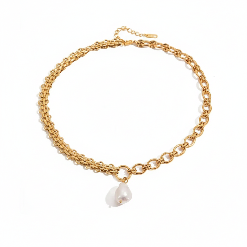 Gold chain bracelet with a pearl charm on a white background