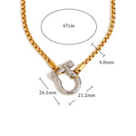 Gold necklace with a silver clasp, showing measurements and material details on a white background.