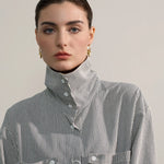 Stainless steel heart love drop hoop earrings with striped shirt display