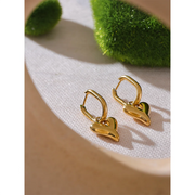 Gold heart-shaped stainless steel hoop earrings, polished finish