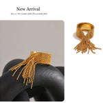 Gold-toned stainless steel adjustable tassel ring with mesh band