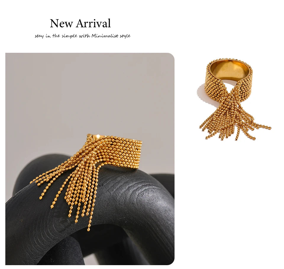 Gold-toned stainless steel adjustable tassel ring with mesh band