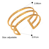 Gold bracelet with measurements and product details on a white background