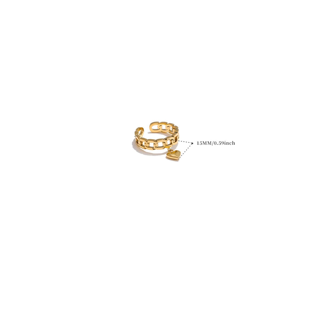 Gold ring with chain detail on a white background