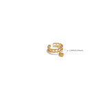 Gold ring with chain detail on a white background