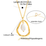 Gold necklace with a pearl pendant, showing measurements and extender chain details.