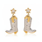 Cowboy boot earrings with star details on a white background