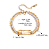 Gold bracelet with clear stones and measurement details on a white background