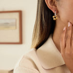 Hollow Flower Charm Huggie Earrings – Waterproof 18K Gold Plated Earrings | Ezra Gems