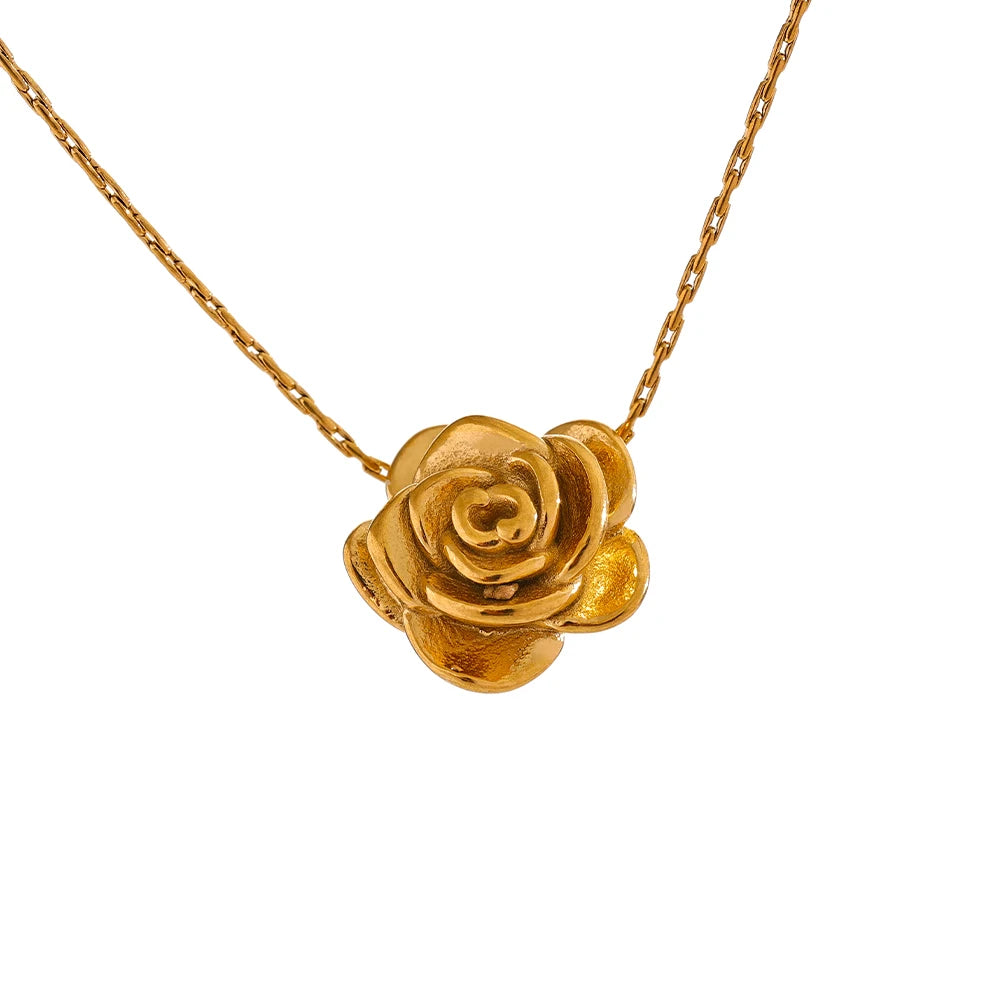 Gold rose-shaped pendant on a chain against a white background