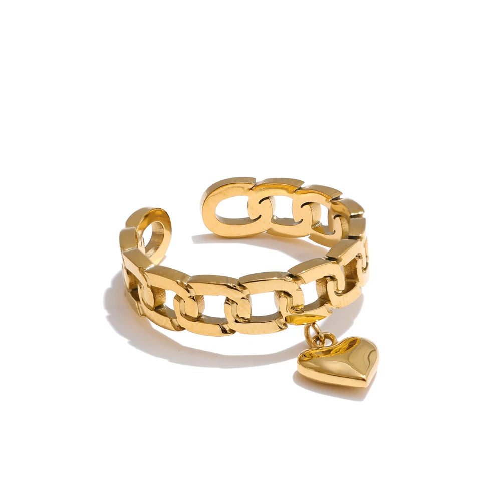 Gold chain bracelet with a heart-shaped padlock on a white background