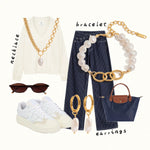 Collection of jewelry and fashion items including a necklace, bracelet, earrings, sunglasses, sneakers, and a handbag on a white background.