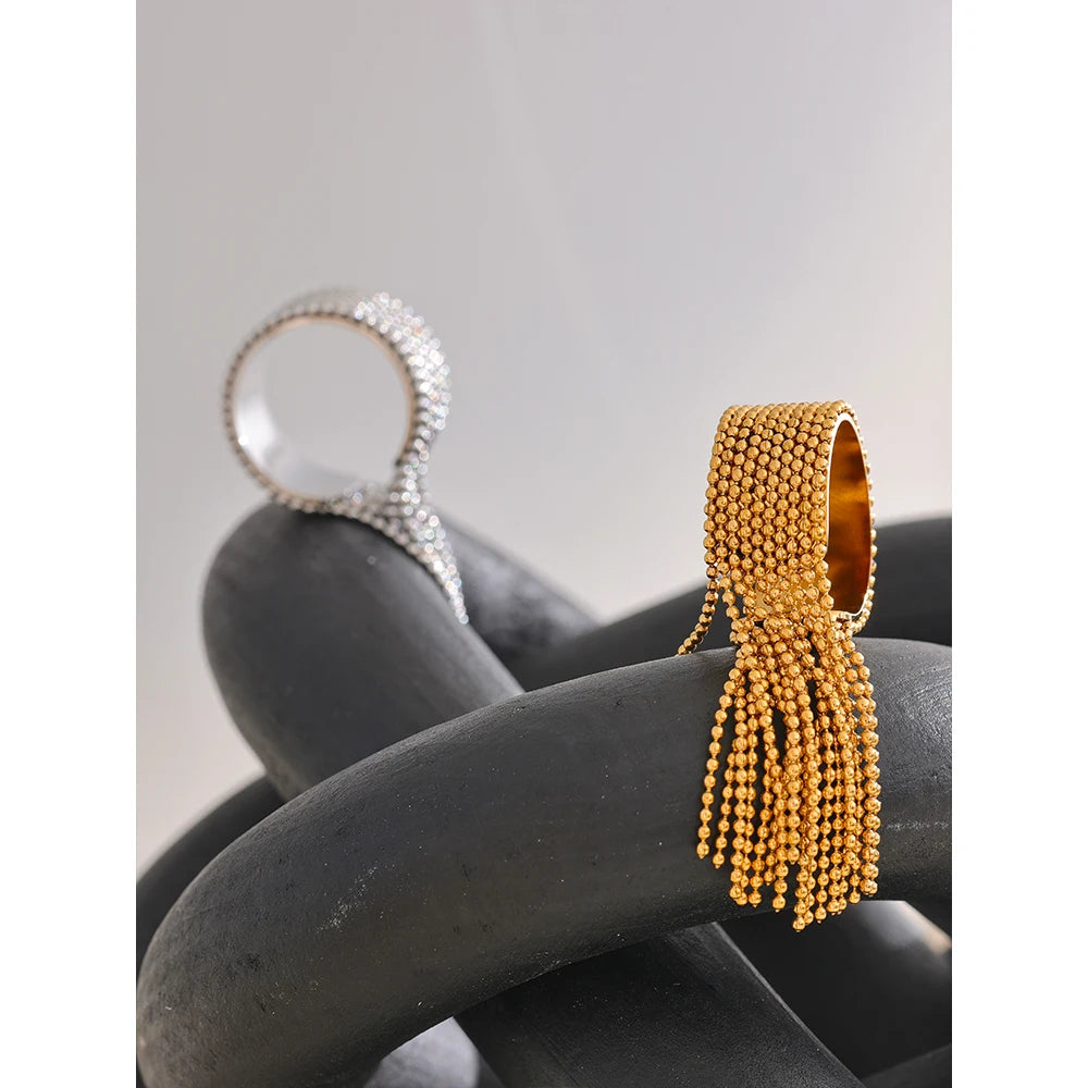 Gold-toned stainless steel beaded tassel ring with textured spherical design