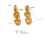 Gold heart-shaped earrings with measurement details on a white background