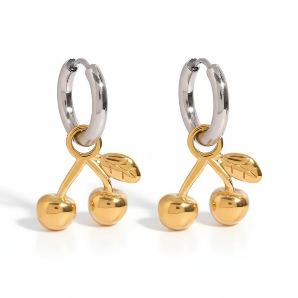 Gold cherry-shaped earrings on a white background