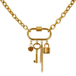 Gold necklace with charms on a white background
