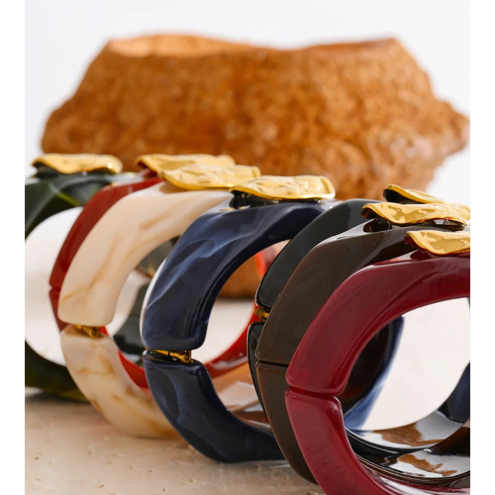Wide statement bangle in black resin with gold-tone stainless steel — Ezra Gems
