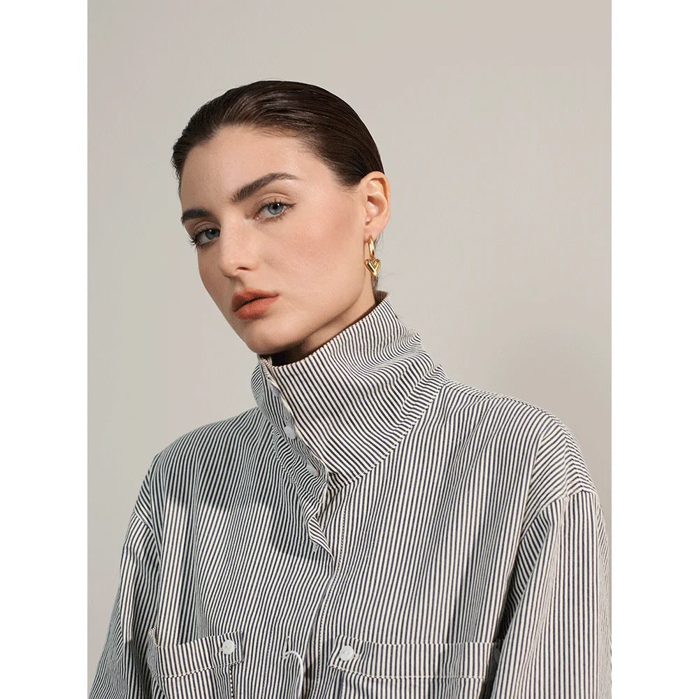 Woman in striped shirt wearing Yhpup stainless steel heart hoop earrings