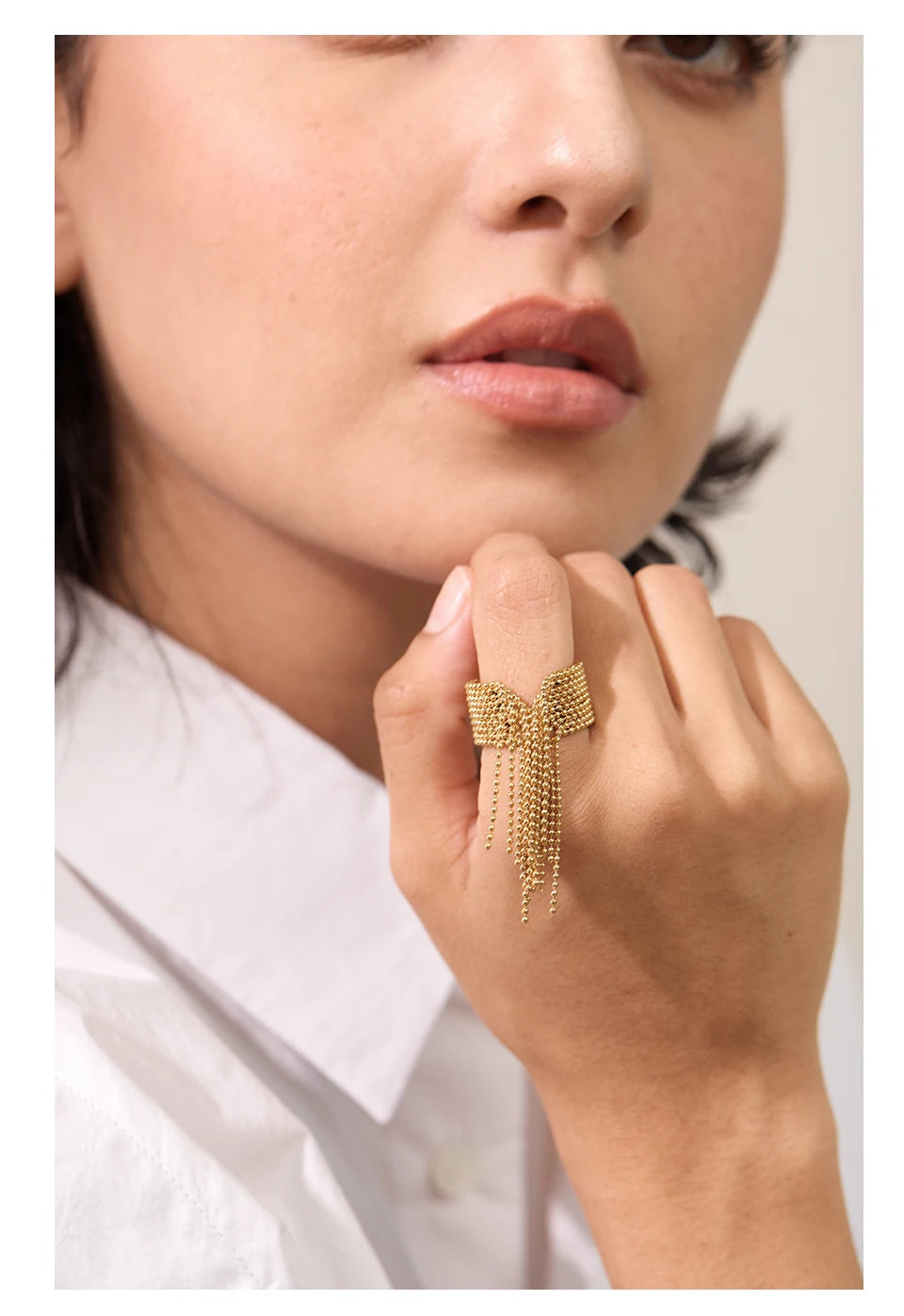 Delicate stainless steel bow ring with chain tassels, adjustable 18K gold plated