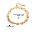 Gold bracelet with pink stones and measurement details on a white background
