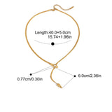 Gold necklace with measurement details on a white background