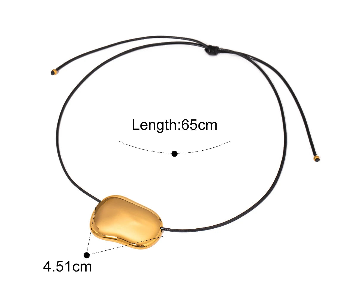 Gold necklace with measurements on a white background