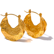 Pair of gold hoop earrings on a white background