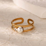 Modern Adjustable Double Band Pearl Ring with 18K gold plating, accented with a pearl and crystal for a refined, elegant style.