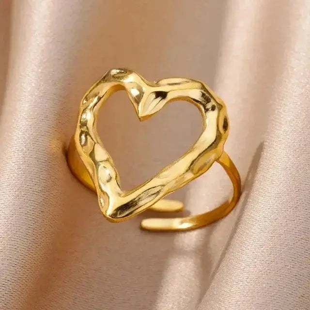 Adjustable gold heart ring with smooth polished finish on stainless steel, lightweight and durable for everyday elegance