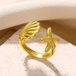 Beautiful adjustable Gold Starfish Shell Ring, 18K gold-plated, offering a beachy, elegant look for any outfit.