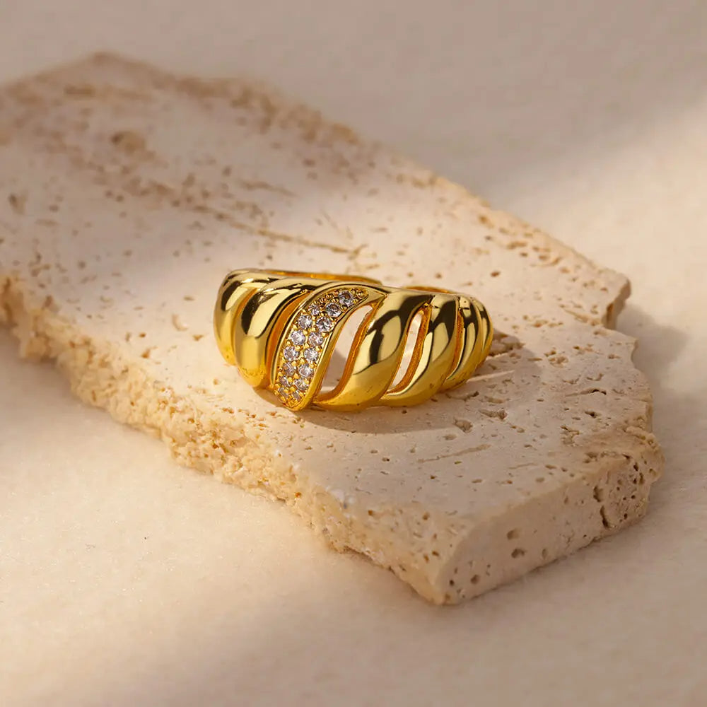 Stylish Adjustable Golden Wave Ring with sparkling crystals, 18K gold-plated, designed for comfort and bold elegance.